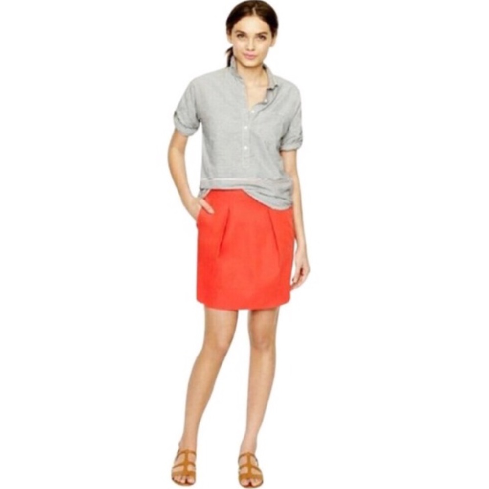 Bright orange j crew skirt.
